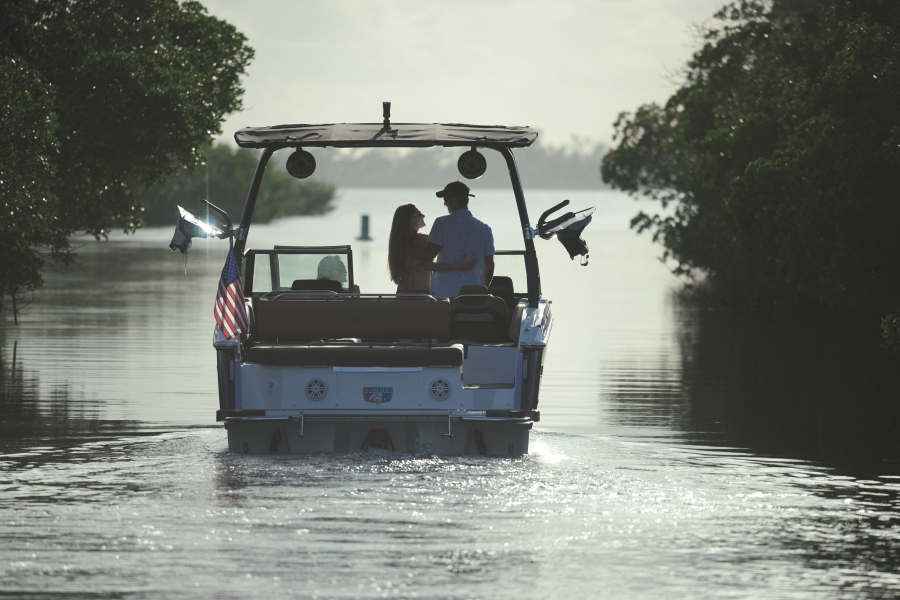 Two people hugging on a boat